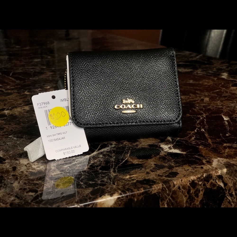 Black Coach women’s wallet.